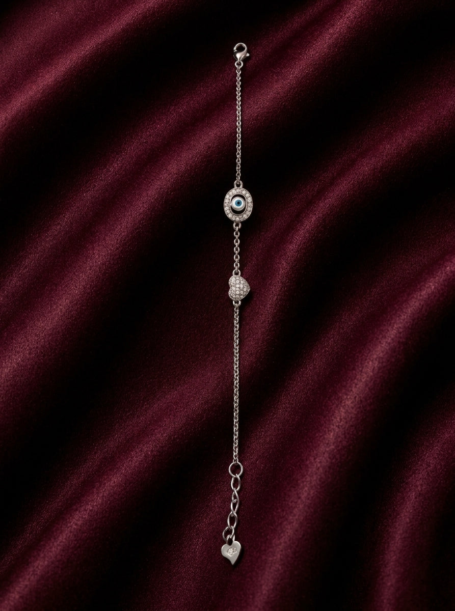 Evil Eye & Sparkling Heart Charm Bracelet in Silver Finish