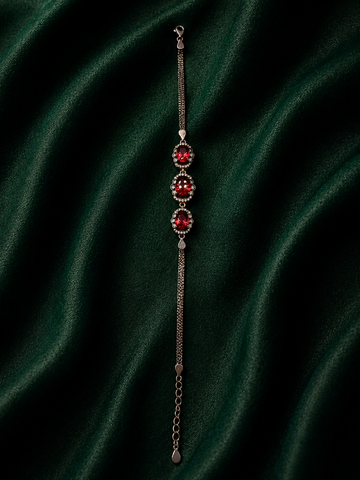 Crimson Elegance Sterling Silver Ruby Oval Halo Bracelet