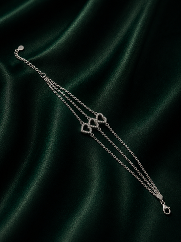 Amara Triple-Strand Silver Heart Bracelet – Pave Crystal Interlocking Hearts