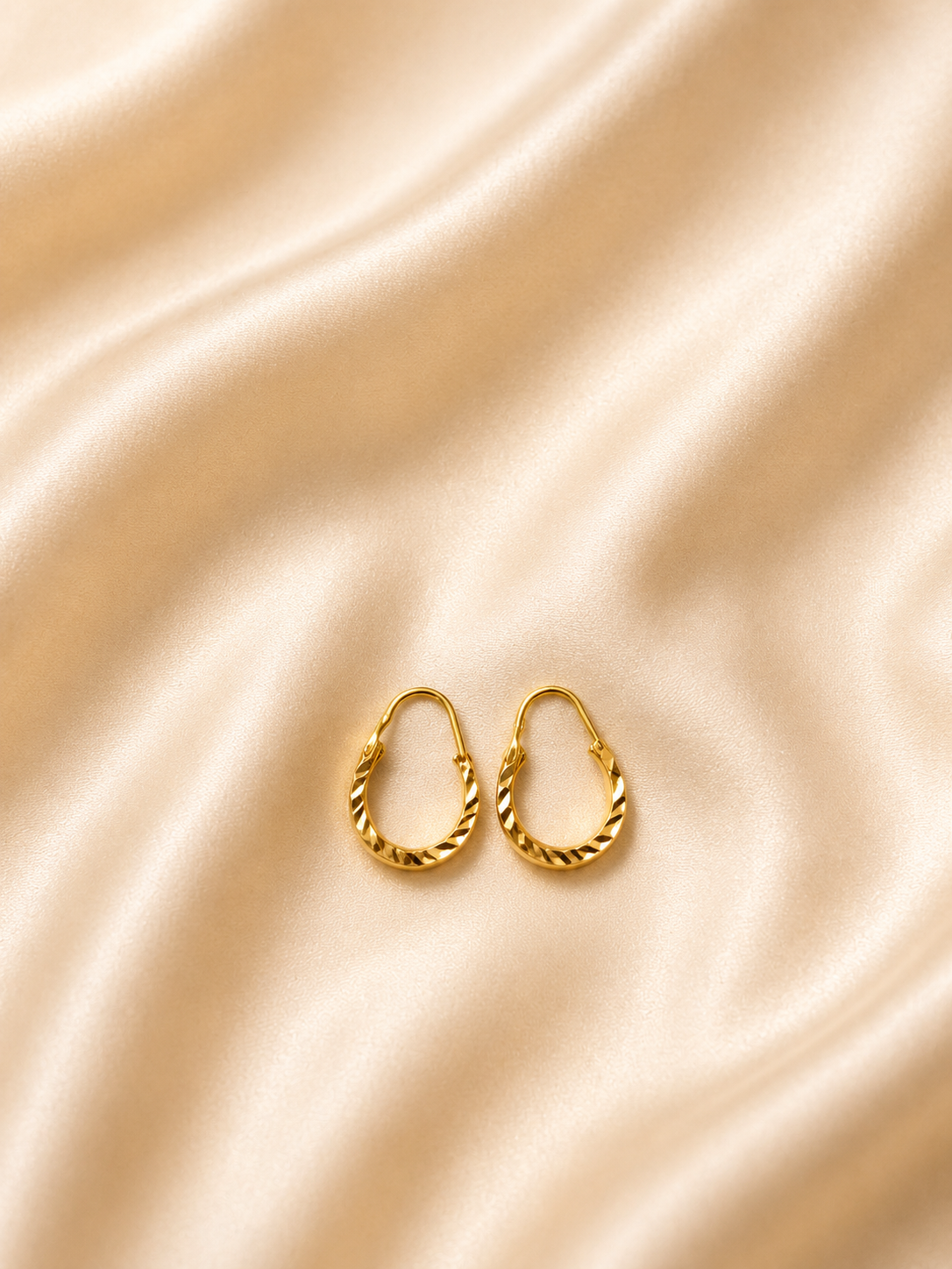 Twist & Shimmer Gold Drop Hoop Earrings